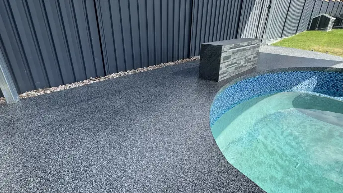 Ultra Flake flooring beside a pool