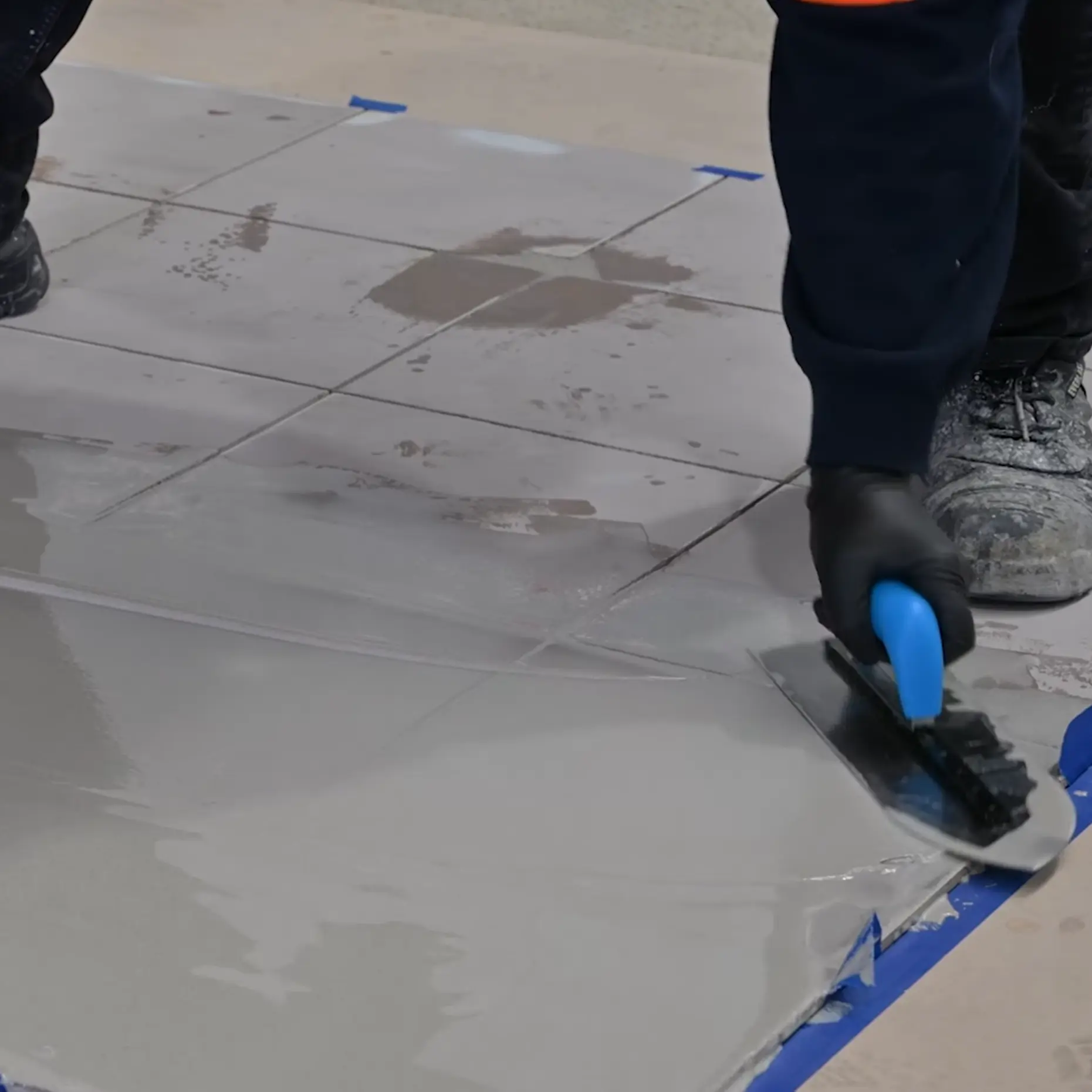 Filling grout lines in tiles
