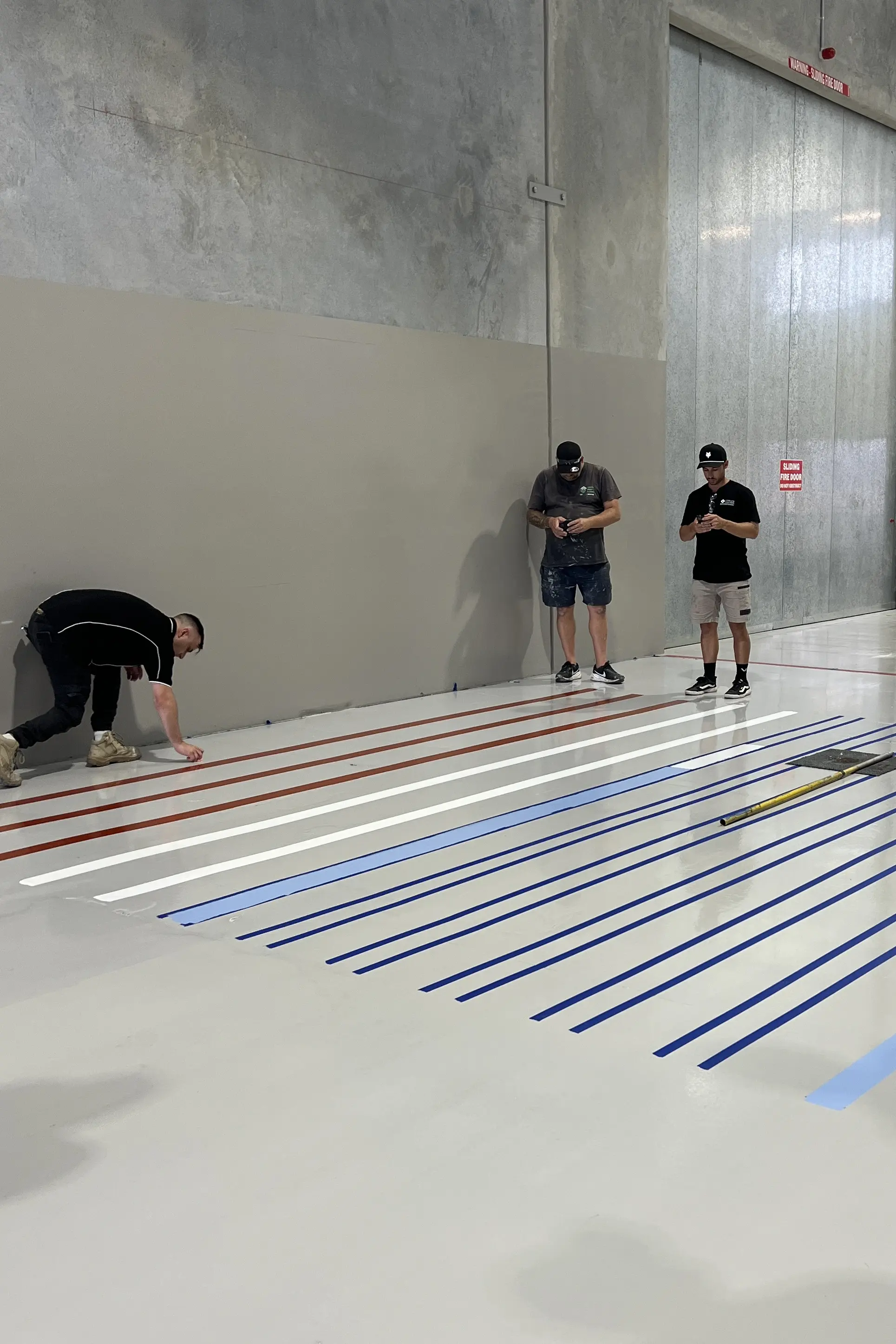 Commercial Epoxy training showing line marking 