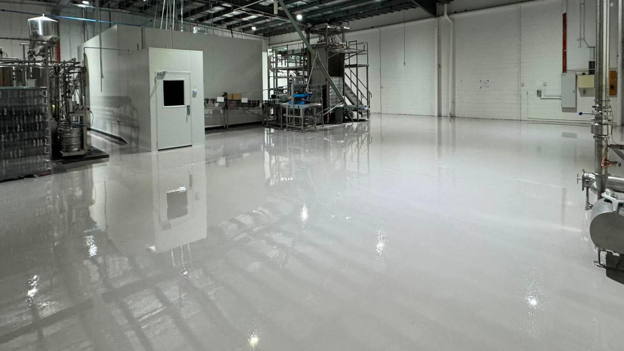 Moisture-tolerant epoxy flooring specified for commercial facility, Cheltenham VIC
